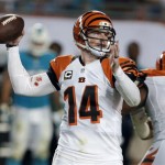 Cincinnati Bengals quarterback Andy Dalton looks to pass during the first half of an NFL football game against the Miami Dolphins, Thursday, Oct. 31, 2013, in Miami Gardens, Fla. (AP Photo/Lynne Sladky)
