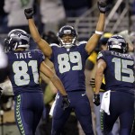 Seattle Seahawks wide receiver Doug Baldwin (89) celebrates after he scored a touchdown against the New Orleans Saints in the first half of an NFL football game, Monday, Dec. 2, 2013, in Seattle. (AP Photo/Scott Eklund)