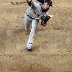 San Francisco Giants pitcher Tim Lincecum delivers against the Arizona Diamondbacks in the second inning of an opening day baseball game, Friday, April 6, 2012, in Phoenix. (AP Photo/Matt York)
