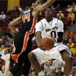Arizona State's Carrick Felix (0) gets past Oregon State's Devon Collier (44) for a score during the first half of an NCAA college basketball game Saturday, Jan. 14, 2012, in Tempe, Ariz.(AP Photo/Ross D. Franklin)