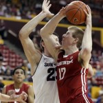 Washington State forward Brock Motum, right, of Australia, attempts a 
shot over Arizona State center Ruslan Pateev, left, of Russia, in the 
first half on an NCAA college basketball game on Saturday, Jan. 28, 
2012, in Tempe, Ariz. Motum was the game's high-scorer with 34 
points. Arizona State won 71-67. (AP Photo/Paul Connors)