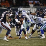 Chicago Bears quarterback Josh McCown (12) pitches the ball to running back Matt Forte (22) during the second half of an NFL football game against the Dallas Cowboys, Monday, Dec. 9, 2013, in Chicago. (AP Photo/Charles Rex Arbogast)
