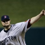 Boston Red Sox starting pitcher Jon Lester throws during the first inning of Game 5 of baseball's World Series against the St. Louis Cardinals Monday, Oct. 28, 2013, in St. Louis. (AP Photo/David J. Phillip)