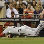 Arizona Diamondbacks third baseman Martin Prado can't make the diving catch on a bunt attempt by San Diego Padres' Jesus Guzman in the eighth inning of a baseball game Tuesday, Sept. 24, 2013, in San Diego. (AP Photo/Lenny Ignelzi)