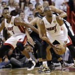 San Antonio Spurs' Tim Duncan (21) works for the ball against and Miami Heat's Dwyane Wade (3) during the first half in Game 7 of the NBA basketball championships, Thursday, June 20, 2013, in Miami. (AP Photo/Lynne Sladky)