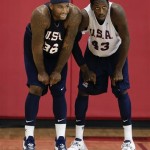 DeMarcus Cousins of the Sacramento Kings, left, and Larry Sanders of the Milwaukee Bucks get set down court during a USA Basketball mini camp scrimmage, Monday, July 22, 2013, in Las Vegas. Twenty-eight of the best young players in the country are in Las Vegas for four days of workouts that essentially mark the kickoff of 2016 Olympic preparations. (AP Photo/Julie Jacobson)