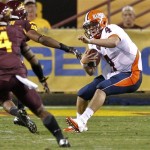 Illinois quarterback Reilly O'Toole (4) scrambles against Arizona State during the first half of an NCAA college football game, Saturday, Sept. 8, 2012, in Tempe, Ariz. (AP Photo/Matt York)
