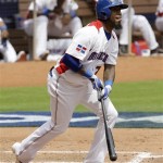 Dominican Republic's Jose Reyes watches his solo home run against Italy in the third inning of the World Baseball Classic game in Miami, Tuesday, March 12, 2013. (AP Photo/Alan Diaz)