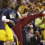 
              Cleveland Cavaliers forward LeBron James reacts on the sidelines late in the second half of Game 4 of the NBA basketball Eastern Conference Finals against the Atlanta Hawks, Tuesday, May 26, 2015, in Cleveland. (AP Photo/Tony Dejak)
            