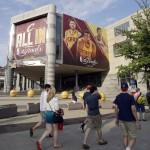 
              In this photo taken, Friday, June 5, 2015, pedestrians pass Quicken Loans Arena in Cleveland. Behold a new, shining Cleveland, once dubbed the Mistake on the Lake. Well, times have changed, and so have the attitudes of skeptical and cynical Cleveland fans, many of whom grew up hoping for the best, expecting the worst and agonizing through moments that have earned dubious nicknames: Red Right 88, The Drive, The Fumble, The Shot, The Move, The Decision. One man has transformed this town. LeBron James has Cleveland believing. (AP Photo/Tony Dejak)
            