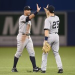 
              New York Yankees' Alex Rodriguez, left, and Mark Teixeira (25) celebrate after defeating the Toronto Blue Jays 6-3 in a baseball game Tuesday, May 5, 2015, in Toronto. (AP Photo/The Canadian Press, Frank Gunn)
            