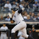 
              New York Yankees designated hitter Alex Rodriguez hits a first-inning sacrifice fly in a baseball game against the Baltimore Orioles at Yankee Stadium in New York, Thursday, May 7, 2015.  (AP Photo/Kathy Willens)
            