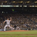 San Francisco Giants starting pitcher Madison Bumgarner throws against the Pittsburgh Pirates in the seventh inning of the NL wild-card playoff baseball game Wednesday, Oct. 1, 2014, in Pittsburgh. (AP Photo/Don Wright)