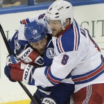 
              New York Rangers defenseman Kevin Klein (8) puts Tampa Bay Lightning left wing Brenden Morrow (10) in a headlock during the third period of Game 4 of the Eastern Conference finals in the NHL hockey Stanley Cup playoffs, Friday, May 22, 2015, in Tampa, Fla. The Rangers defeated the Lightning 5-1. (AP Photo/Phelan M. Ebenhack)
            