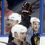 
              Chicago Blackhawks center Andrew Shaw, right, celebrates a shot with center Joakim Nordstrom during practice at the NHL hockey Stanley Cup Final, Friday, June 5, 2015, in Tampa, Fla. The Blackhawks lead the best-of-seven games series against the Tampa Bay Lightning 1-0. Game 2 is scheduled for Saturday night. (AP Photo/Chris Carlson)
            