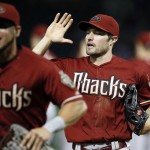 
              Arizona Diamondbacks' David Peralta, left, and A.J. Pollock, right, celebrate with teammates after the final out against the Texas Rangers in a baseball game Wednesday, July 8, 2015, in Arlington, Texas. Pollock hit a three-run home run during a five-run second inning, and the Diamondbacks defeated the Rangers 7-4. (AP Photo/Tony Gutierrez)
            