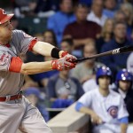 
              Cincinnati Reds' Todd Frazier hits a double against the Chicago Cubs during the fourth inning of a baseball game Saturday, June 13, 2015, in Chicago. (AP Photo/Nam Y. Huh)
            
