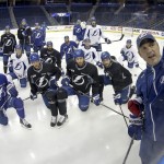 
              Tampa Bay Lightning head coach Jon Cooper talks to his team during practice at the NHL hockey Stanley Cup Final, Friday, June 5, 2015, in Tampa, Fla. The Chicago Blackhawks lead the best-of-seven games series 1-0. Game 2 is scheduled for Saturday night. (AP Photo/Chris Carlson)
            