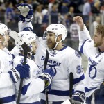 
              The Tampa Bay Lightning celebrate their 2-0 win over the New York Rangers in Game 7 of the Eastern Conference final during the NHL hockey Stanley Cup playoffs, Friday, May 29, 2015, in New York.  (AP Photo/Frank Franklin)
            