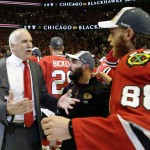 
              Chicago Blackhawks head coach Joel Quenneville celebrates with Patrick Kane (88) after defeating the Tampa Bay Lightning in Game 6 of the NHL hockey Stanley Cup Final series on Monday, June 15, 2015, in Chicago. The Blackhawks defeated the Lightning 2-0 to win the series 4-2. (AP Photo/Nam Y. Huh)
            