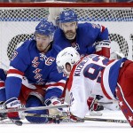 
              New York Rangers defenseman Ryan McDonagh (27) and defenseman Dan Boyle (22) help defend the goal as Washington Capitals center Evgeny Kuznetsov (92) shoots during the second period of Game 7 of the Eastern Conference semifinals during the NHL hockey Stanley Cup playoffs, Wednesday, May 13, 2015, in New York. (AP Photo/Kathy Willens)
            