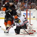 
              Chicago Blackhawks goalie Corey Crawford, right, blocks a shot by Anaheim Ducks left wing Patrick Maroon during the second period of Game 2 of the Western Conference final during the NHL hockey Stanley Cup playoffs in Anaheim, Calif., on Tuesday, May 19, 2015. (AP Photo/Mark J. Terrill)
            