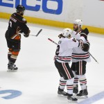 
              Chicago Blackhawks defenseman Brent Seabrook, right, celebrates after scoring with Duncan Keith during the third period in Game 7 of the Western Conference final of the NHL hockey Stanley Cup playoffs against the Anaheim Ducks in Anaheim, Calif., Saturday, May 30, 2015.  (AP Photo/Mark J. Terrill)
            