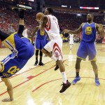 
              File-This May 25, 2015, file photo shows Golden State Warriors guard Stephen Curry, left, toppling over Houston Rockets forward Trevor Ariza (1) during the first half in Game 4 of the Western Conference finals of the NBA basketball playoffs in Houston. When NBA union chief Michele Roberts watched Stephen Curry return to a game after his head slammed against the floor and he walked woozily to the locker room, she immediately boned up on the league's concussion protocols.  (AP Photo/David J. Phillip, File)
            