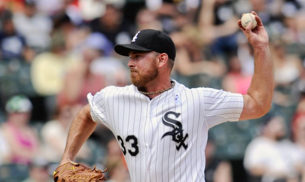 Chicago White Sox pitcher Zach Duke delivers against the Texas Rangers during a baseball game on Su...