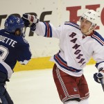 
              New York Rangers right wing Jesper Fast, right, of Sweden, and Tampa Bay Lightning center Cedric Paquette (13) tussle during the third period of Game 4 of the Eastern Conference finals in the NHL hockey Stanley Cup playoffs, Friday, May 22, 2015, in Tampa, Fla.The Rangers won 5-1.  (AP Photo/Phelan M. Ebenhack)
            