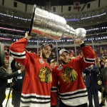 
              Chicago Blackhawks center Jonathan Toews and Chicago Blackhawks right wing Patrick Kane celebrate after defeating the Tampa Bay Lightning in Game 6 of the NHL hockey Stanley Cup Final series on Monday, June 15, 2015, in Chicago. The Blackhawks defeated the Lightning 2-0 to win the series 4-2. (AP Photo/Nam Y. Huh)
            