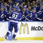 
              Tampa Bay Lightning center Steven Stamkos (91) celebrates with the team bench after scoring against the Montreal Canadiens during the second period of Game 6 of a second-round NHL Stanley Cup hockey playoff series Tuesday, May 12, 2015, in Tampa, Fla. (AP Photo/Chris O'Meara)
            