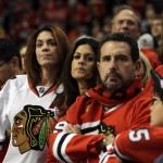 
              Chicago Blackhawks fans react near the end of the third period in Game 3 of the NHL hockey Stanley Cup Final against the Tampa Bay Lightning on Monday, June 8, 2015, in Chicago. The Lightning won 3-2. (AP Photo/Nam Y. Huh)
            