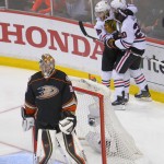 
              Anaheim Ducks goalie Frederik Andersen, bottom, looks away as Chicago Blackhawks left wing Brandon Saad, right, celebrates his goal with his teammates during the second period in Game 7 of the Western Conference final of the NHL hockey Stanley Cup playoffs in Anaheim, Calif., Saturday, May 30, 2015. (AP Photo/Mark J. Terrill)
            