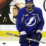 
              Tampa Bay Lightning center Alex Killorn stretches during NHL hockey practice at Amalie Arena for the Stanley Cup Finals, Tuesday, June 2, 2015, in Tampa, Fla. The Lightning will take on the Chicago Blackhawks in Game 1 on Wednesday.  (AP Photo/Chris O'Meara)
            