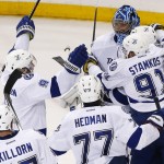 
              The Tampa Bay Lightning celebrate their 2-0 win over the New York Rangers in Game 7 of the Eastern Conference final during the NHL hockey Stanley Cup playoffs, Friday, May 29, 2015, in New York. (AP Photo/Kathy Willens)
            