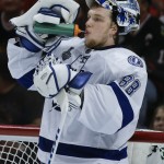 
              Tampa Bay Lightning goalie Andrei Vasilevskiy pauses during a timeout in the second period in Game 4 of the NHL hockey Stanley Cup Final against the Chicago Blackhawks Wednesday, June 10, 2015, in Chicago. (AP Photo/Nam Y. Huh)
            