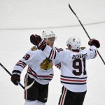 
              Chicago Blackhawks center Jonathan Toews, left, celebrates with Brad Richards after scoring against the Anaheim Ducks during the first period in Game 7 of the Western Conference final of the NHL hockey Stanley Cup playoffs in Anaheim, Calif., Saturday, May 30, 2015.  (AP Photo/Mark J. Terrill)
            