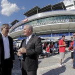 
              In this photo taken, Wednesday, June 3, 2015, Tampa Bay Lightning owner Jeff Vinik, left, chats with Tampa, Fla., Mayor Bob Buckhorn before Game 1 of the NHL hockey Stanley Cup Final in Tampa, Fla. While Sun Belt NHL teams from Phoenix to Miami struggle to maintain revenue and relevance in their communities, the Lightning are thriving. The franchise’s second trip to the Stanley Cup Final is the highlight of a revival under owner Jeff Vinik as the organization builds a vibrant hockey town in a warm-weather climate. Game 2 is scheduled for Saturday night against the Chicago Blackhawks. (AP Photo/Chris O'Meara)
            