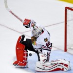 
              Chicago Blackhawks goalie Corey Crawford blocks a shot against the Anaheim Ducks during the first period in Game 5 of the Western Conference final of the NHL hockey Stanley Cup playoffs in Anaheim, Calif., on Monday, May 25, 2015. (AP Photo/Mark J. Terrill)
            