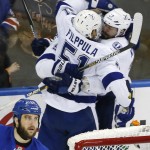 
              Tampa Bay Lightning center Valtteri Filppula (51) congratulates center Alex Killorn (17) after Killorn scored a goal against the New York Rangers during the third period of Game 7 of the Eastern Conference final during the NHL hockey Stanley Cup playoffs, Friday, May 29, 2015, in New York. (AP Photo/Kathy Willens)
            