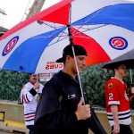 
              Fans leave Wrigley Field after rain postponed a baseball game between the Chicago Cubs and the Cleveland Indians, Monday, June 15, 2015, in Chicago. (AP Photo/Matt Marton)
            