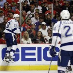 
              Tampa Bay Lightning's Cedric Paquette, left, celebrates after scoring during the third period in Game 3 of the NHL hockey Stanley Cup Final against the Chicago Blackhawks on Monday, June 8, 2015, in Chicago. The Lightning won 3-2. (AP Photo/Nam Y. Huh)
            