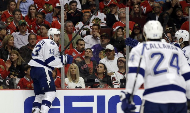 Tampa Bay Lightning’s Cedric Paquette, left, celebrates after scoring during the third period...
