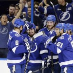 
              Members of the Tampa Bay Lightning celebrate after Alex Killorn's  (17) goal against the Chicago Blackhawks during the first period in Game 1 of the NHL hockey Stanley Cup Final in Tampa, Fla., Wednesday, June 3, 2015.  (AP Photo/Chris O'Meara)
            