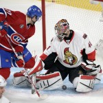               Ottawa Senators goalie Craig Anderson (41) stops Montreal Canadiens center Alex Galchenyuk (27) during the second period of Game 5 of a first-round NHL hockey playoff series, Friday, April 24, 2015, in Montreal. (Ryan Remiorz/The Canadian Press via AP)
            
