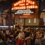 
              Chicago Blackhawks fans celebrate near Wrigley Field after the Blackhawks defeated the Tampa Bay Lightning to win the NHL hockey Stanley Cup, Monday, June 15, 2015, in Chicago. (AP Photo/Paul Beaty)
            