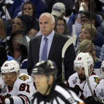 
              Chicago Blackhawks head coach Joel Quenneville watches during the first period in Game 2 of the NHL hockey Stanley Cup Final against the Tampa Bay Lightning in Tampa, Fla., Saturday, June 6, 2015.  (AP Photo/Chris O'Meara)
            