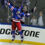 
              New York Rangers center Derek Stepan (21) reacts after scoring the winning goal against the Washington Capitals in overtime of Game 7 of the Eastern Conference semifinals during the NHL hockey Stanley Cup playoffs, Wednesday, May 13, 2015, in New York. The Rangers won 2-1. (AP Photo/Julie Jacobson)
            
