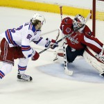 
              A penalty shot by New York Rangers left wing Carl Hagelin (62), from Sweden, is caught by Washington Capitals goalie Braden Holtby (70) during the third period of Game 4 in the second round of the NHL Stanley Cup hockey playoffs, Wednesday, May 6, 2015, in Washington.  The Capitals won 2-1. (AP Photo/Alex Brandon)
            